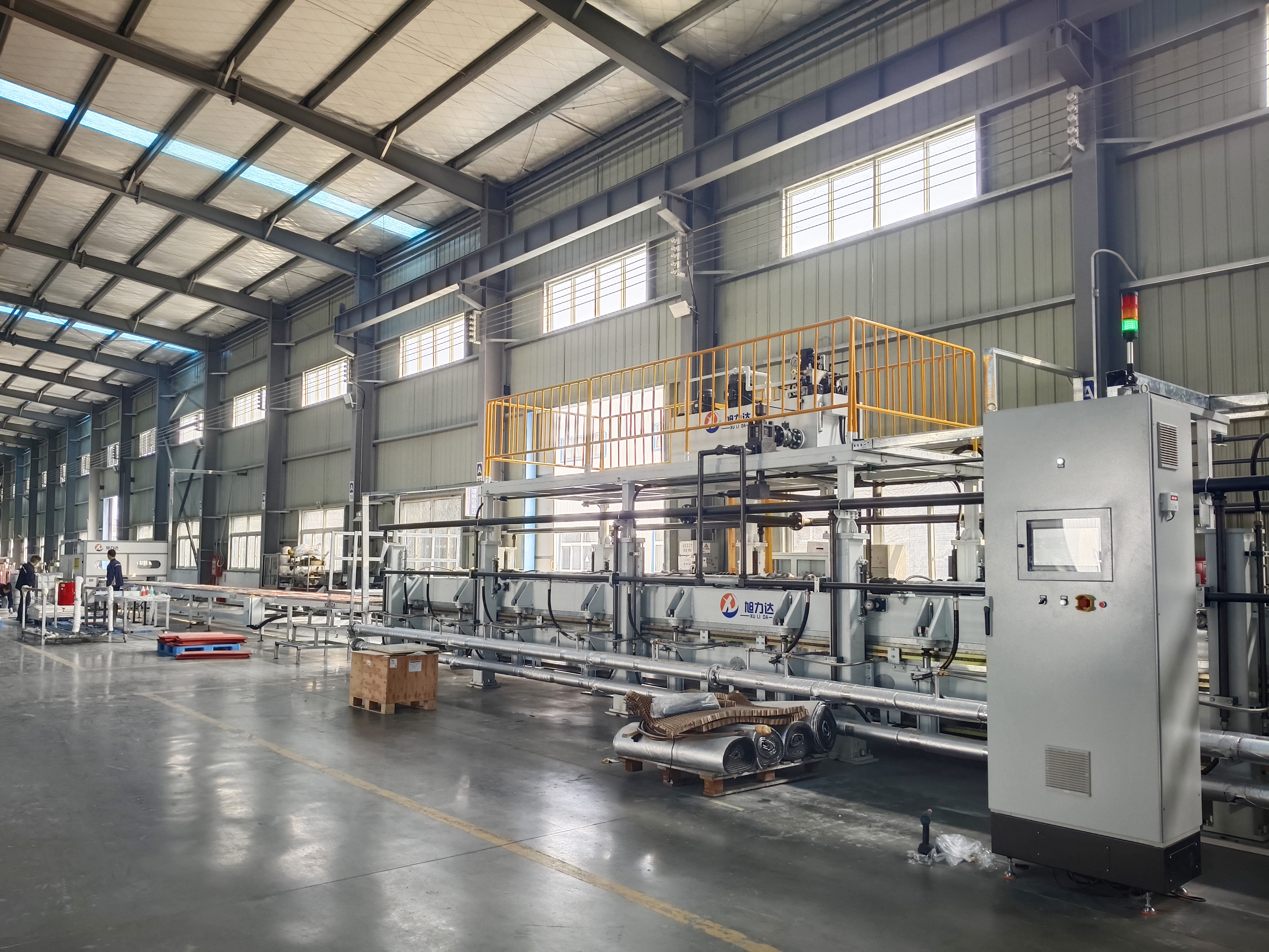 "What are the advantages of a polyurethane adhesive board composite production line?"